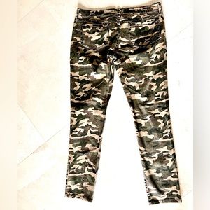 Juniors camouflage, distressed jeans by Miley Cyrus. Size 17 juniors.